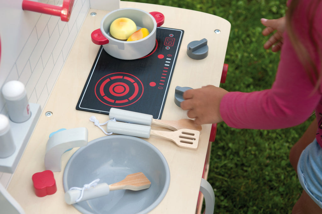 8 piece Red wooden play kitchen.