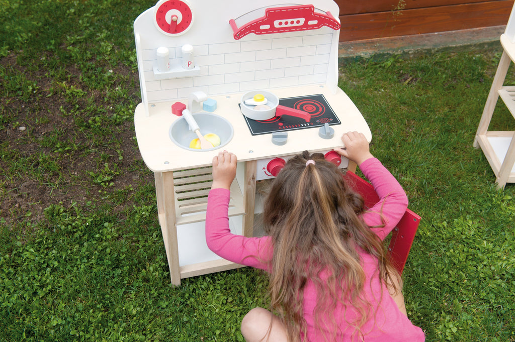 8 piece Red wooden play kitchen.