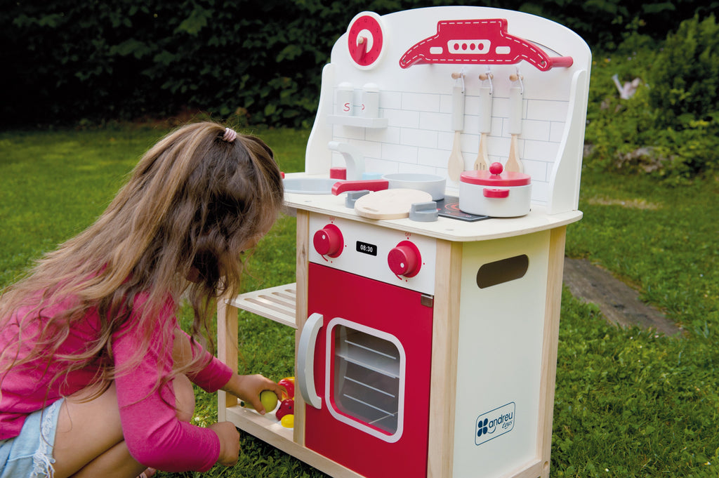 8 piece Red wooden play kitchen.