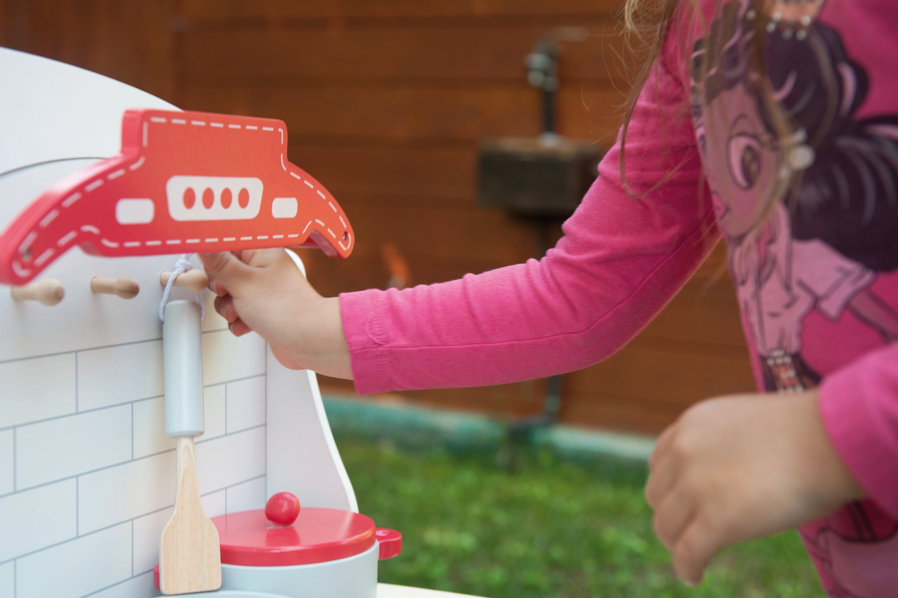 8 piece Red wooden play kitchen.