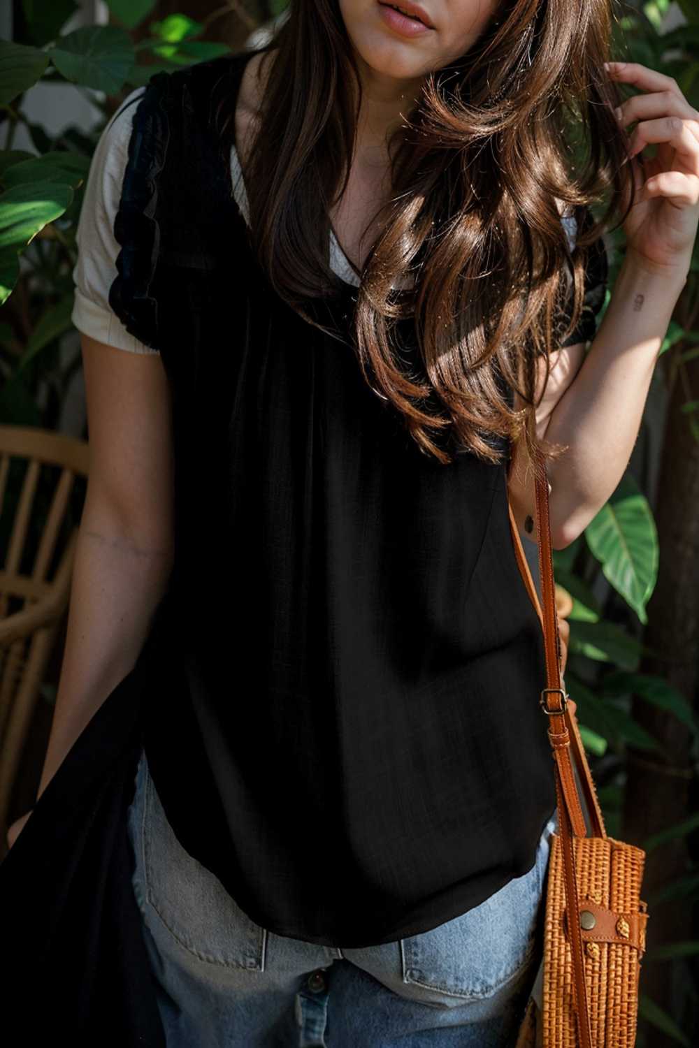 chic black ruffle trim v neck tank top